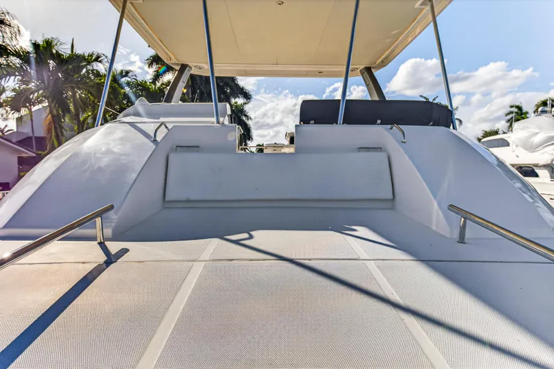  Yacht Photos Pics 2017 Leopard 43 Powercat deck with seating, under sunny skies and palm trees.