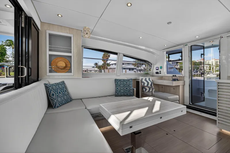  Yacht Photos Pics Luxurious interior of 2017 Leopard 43 Powercat yacht with modern seating and decor.