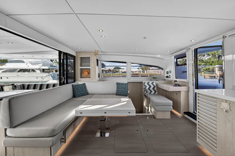  Yacht Photos Pics Luxurious interior of 2017 Leopard 43 Powercat yacht with modern seating and elegant design.