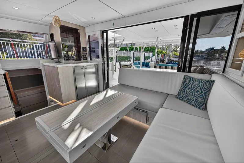  Yacht Photos Pics Luxurious interior of 2017 Leopard 43 Powercat with modern seating and elegant decor.