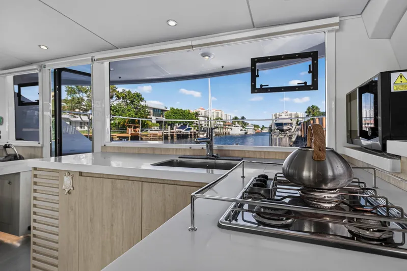  Yacht Photos Pics Modern kitchen interior on 2017 Leopard 43 Powercat with scenic waterway view.