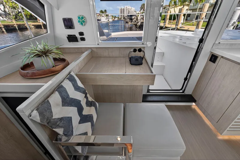  Yacht Photos Pics Interior of 2017 Leopard 43 Powercat with modern seating and nautical decor.