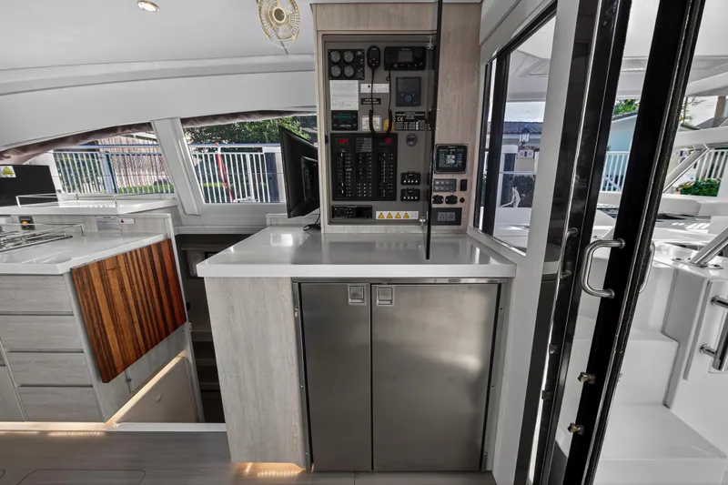  Yacht Photos Pics Interior of 2017 Leopard 43 Powercat yacht featuring modern control panel and sleek design.