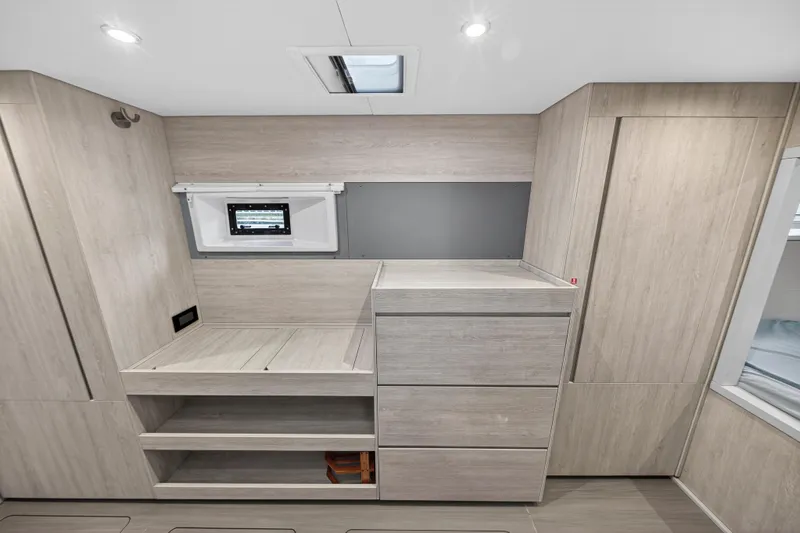  Yacht Photos Pics Modern interior of 2017 Leopard 43 Powercat with light wood cabinetry and sleek design.