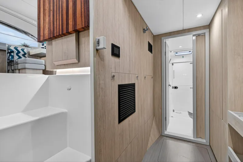  Yacht Photos Pics Interior of 2017 Leopard 43 Powercat yacht, featuring modern design and wooden accents.