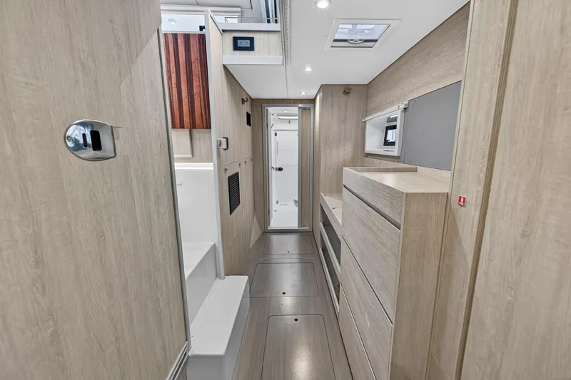  Yacht Photos Pics Interior of 2017 Leopard 43 Powercat, featuring modern wood finishes and sleek design.