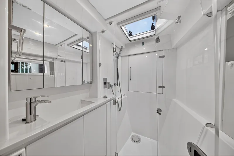  Yacht Photos Pics Luxurious bathroom in 2017 Leopard 43 Powercat yacht with modern fixtures and skylight.
