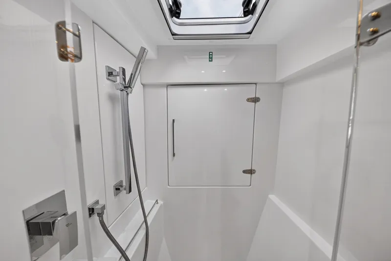  Yacht Photos Pics 2017 Leopard 43 Powercat shower area with modern fixtures and sleek design.