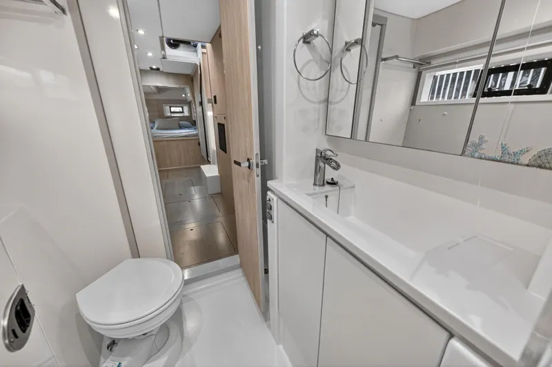  Yacht Photos Pics Bathroom interior of 2017 Leopard 43 Powercat yacht, featuring modern fixtures and sleek design.