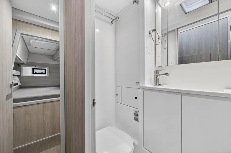  Yacht Photos Pics Modern bathroom and cabin interior of 2017 Leopard 43 Powercat yacht.