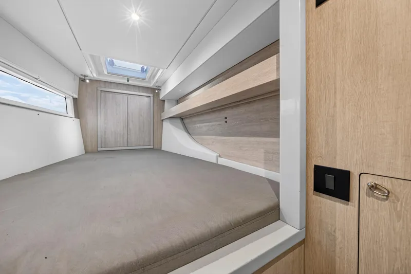  Yacht Photos Pics Interior cabin of 2017 Leopard 43 Powercat, featuring modern design and skylight.