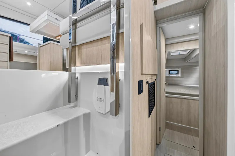  Yacht Photos Pics Interior of 2017 Leopard 43 Powercat yacht, featuring modern design and wood accents.