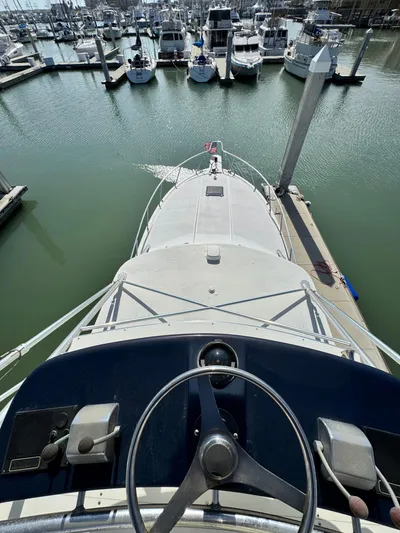 Island Time Yacht Photos Pics Bertram 36 Moppie 1997 yacht docked at marina, view from helm.