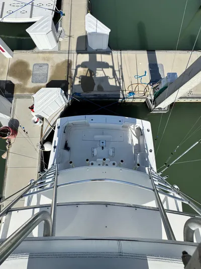 Island Time Yacht Photos Pics Overhead view of a 1997 Bertram 36 Moppie yacht docked at a marina.