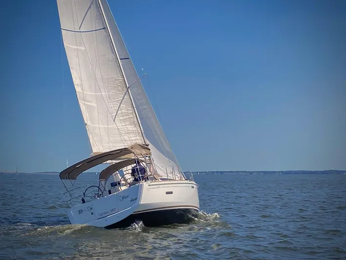 Glide Away Yacht Photos Pics 2015 Jeanneau Sun Odyssey 379 sailing on open water.