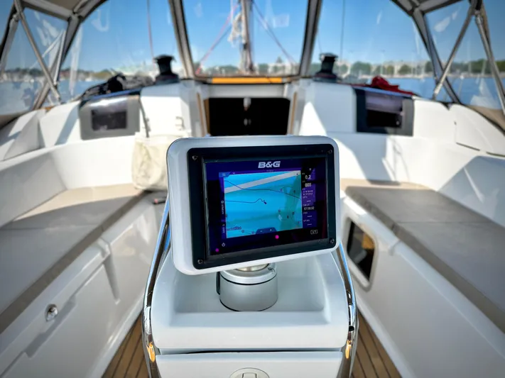 Glide Away Yacht Photos Pics Jeanneau Sun Odyssey 379 cockpit with navigation system, 2015 model, featuring modern design and technology.