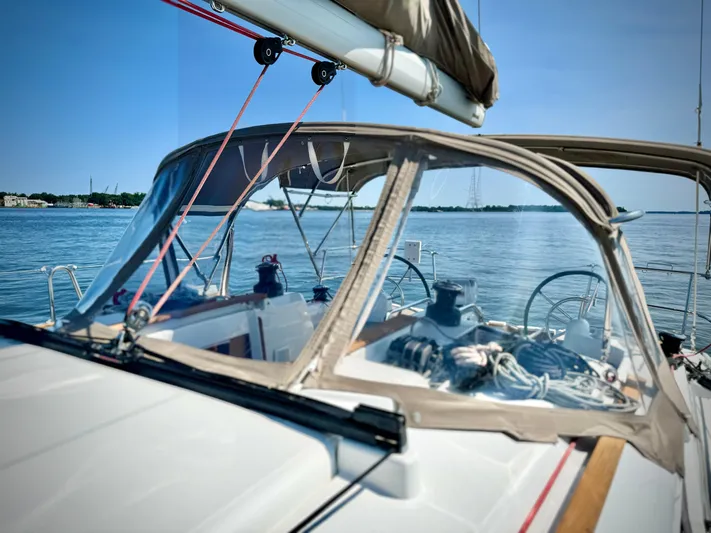 Glide Away Yacht Photos Pics 2015 Jeanneau Sun Odyssey 379 sailboat cockpit with ocean view.