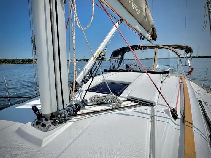 Glide Away Yacht Photos Pics 2015 Jeanneau Sun Odyssey 379 sailboat deck with rigging and clear sky.