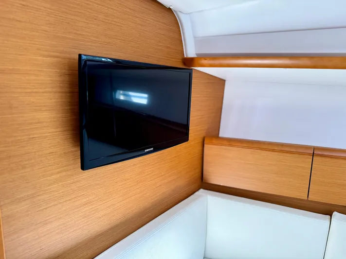 Glide Away Yacht Photos Pics Flat-screen TV in 2015 Jeanneau Sun Odyssey 379 yacht interior.