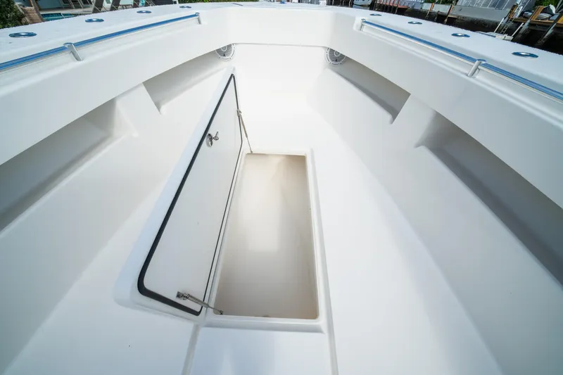 Carried Away Yacht Photos Pics 2016 Invincible 36 Open Fisherman boat storage compartment, open hatch view.