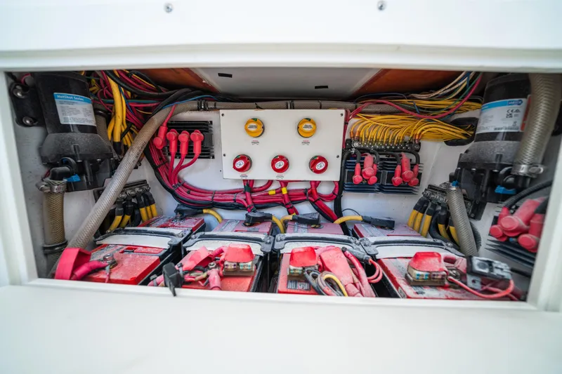 Carried Away Yacht Photos Pics Electrical system of a 2016 Invincible 36 Open Fisherman boat, featuring batteries and wiring.