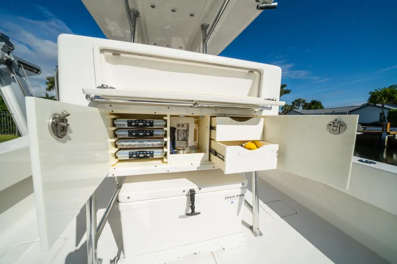 Carried Away Yacht Photos Pics 2016 Invincible 36 Open Fisherman boat with open storage compartments and drawers.