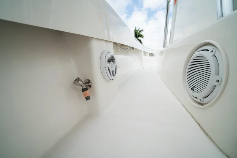 Carried Away Yacht Photos Pics 2016 Invincible 36 Open Fisherman boat deck with speakers and faucet.