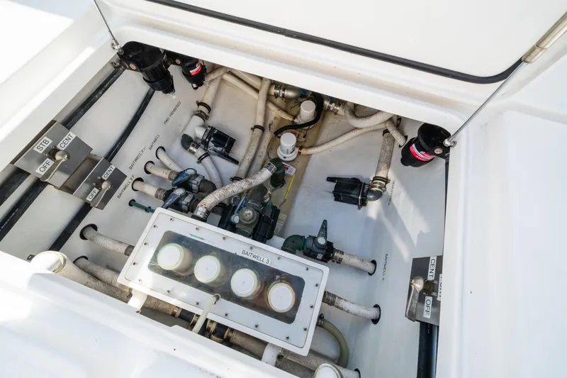 Carried Away Yacht Photos Pics 2016 Invincible 36 Open Fisherman boat plumbing system with labeled valves and hoses.