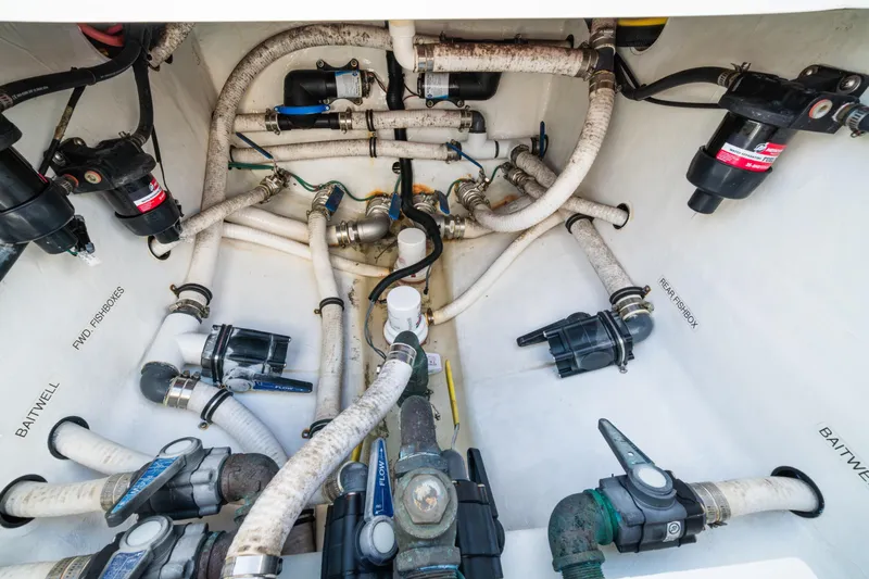Carried Away Yacht Photos Pics Bilge area of 2016 Invincible 36 Open Fisherman with pumps and hoses.
