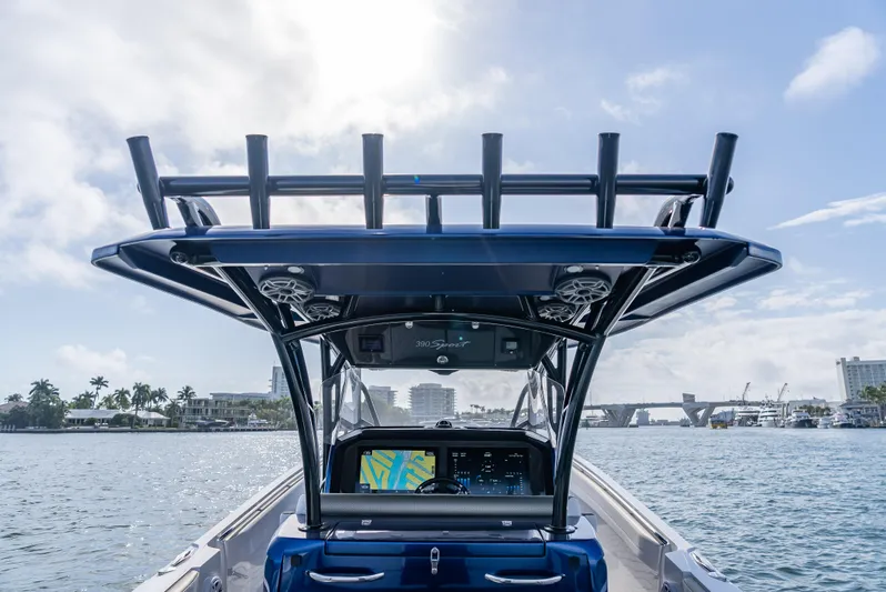 Work From Home Yacht Photos Pics 2024 Nor-Tech 390 Sport boat on water, featuring advanced navigation system and sleek design.