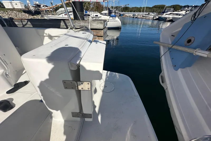 Lucky Dog Yacht Photos Pics 2002 Mainship 390 Trawler docked at marina, showing deck and water view.