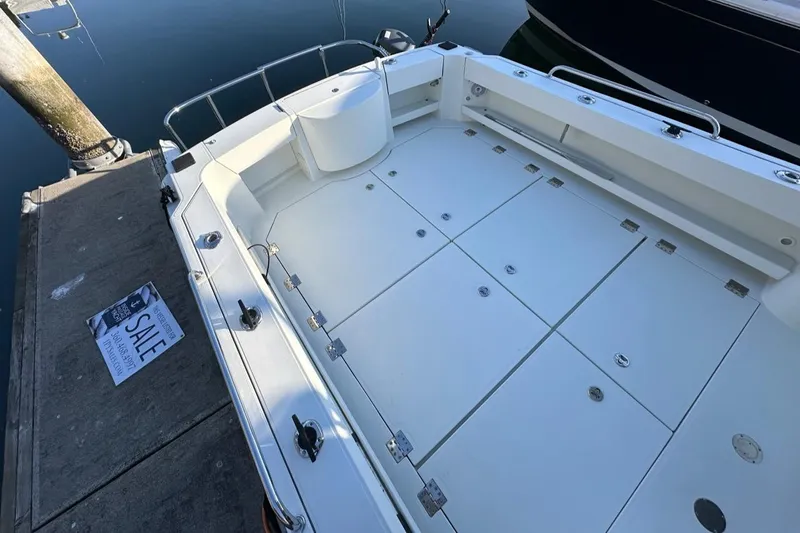  Yacht Photos Pics 2010 Ocean Sport Roamer boat for sale, docked with spacious deck and clean design.