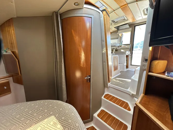  Yacht Photos Pics Interior of 2018 Cutwater C-302 Coupe, featuring wood accents and modern design elements.
