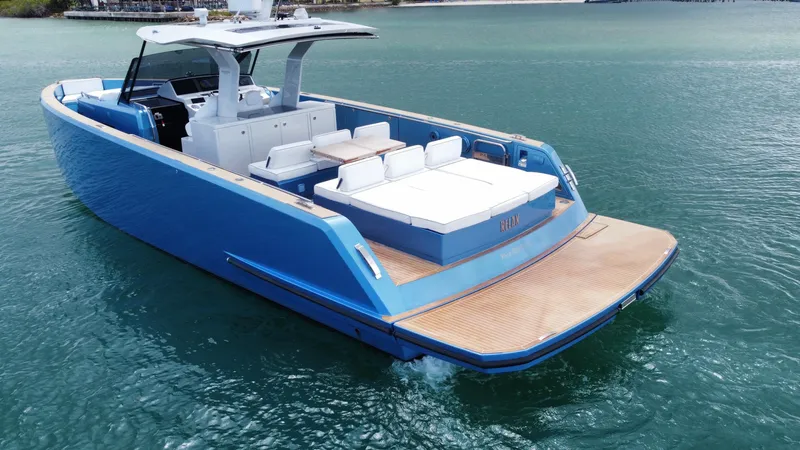  Yacht Photos Pics 2022 Pardo Yachts 43 in blue, cruising on calm waters with elegant design and spacious deck.