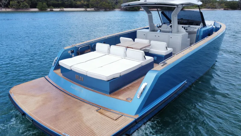  Yacht Photos Pics 2022 Pardo Yachts 43 in blue, featuring spacious deck and luxurious seating on calm waters.