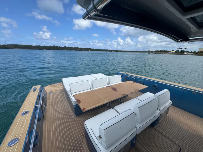  Yacht Photos Pics 2022 Pardo Yachts 43 deck with seating, table, and ocean view.