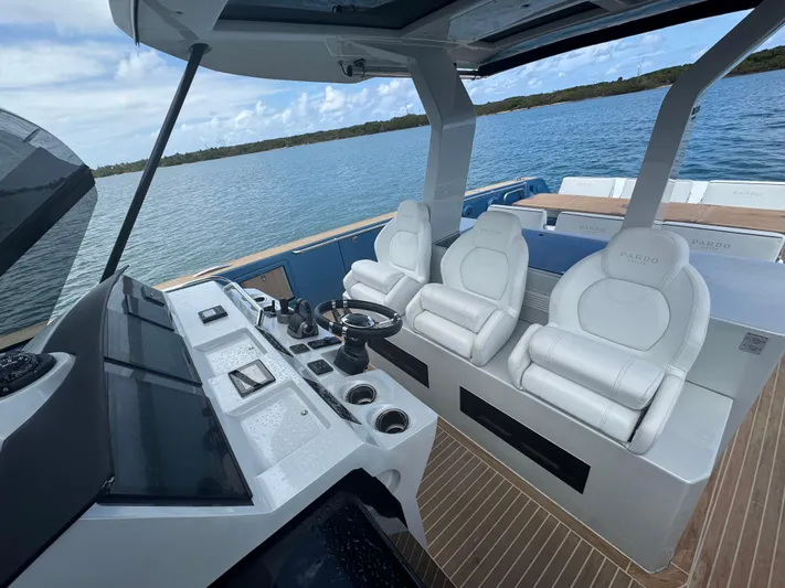 Yacht Photos Pics Luxury interior of 2022 Pardo Yachts 43 with sleek helm and plush seating.