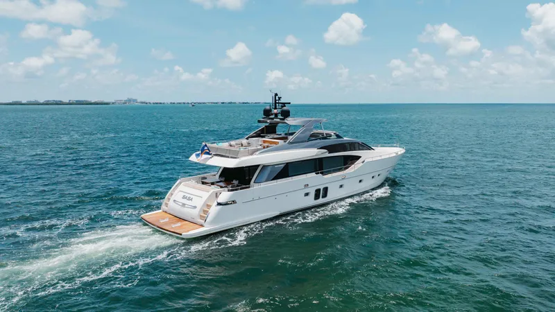 Sasa Yacht Photos Pics 2022 Sanlorenzo SL86 yacht cruising on open sea under blue sky.
