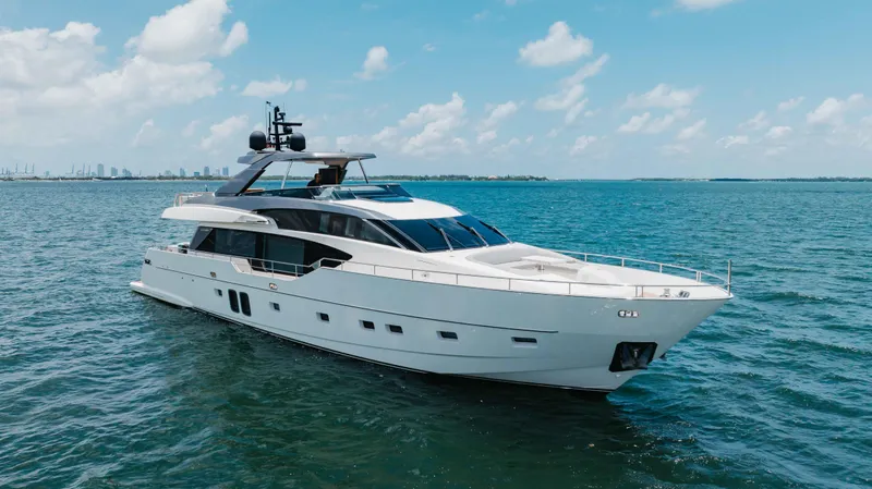 Sasa Yacht Photos Pics Luxurious 2022 Sanlorenzo SL86 yacht cruising on open water under a clear blue sky.