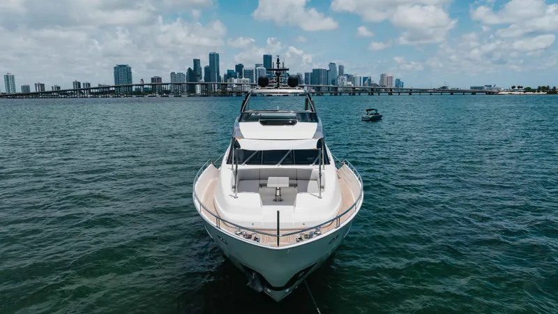 Sasa Yacht Photos Pics Sanlorenzo SL86 yacht on water with city skyline in background, 2022 model.
