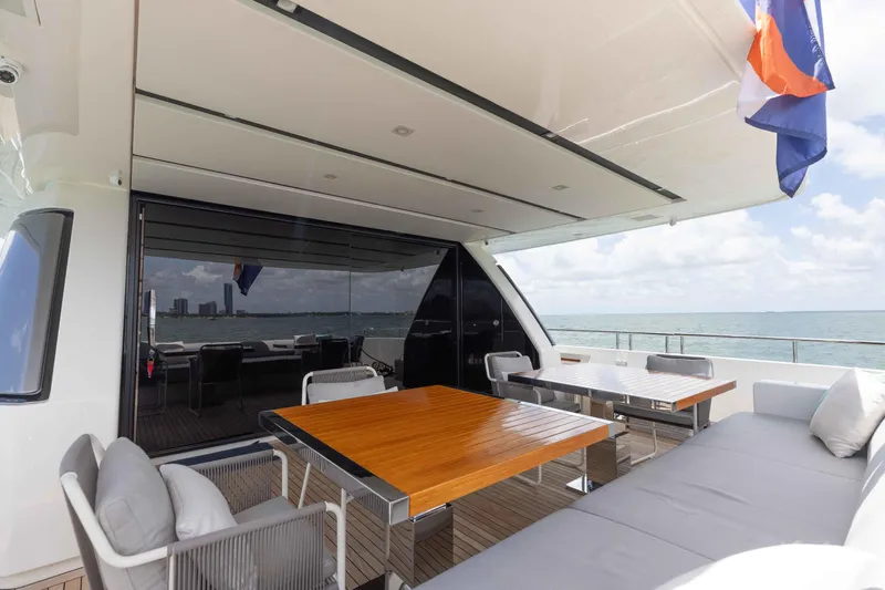 Sasa Yacht Photos Pics Luxurious 2022 Sanlorenzo SL86 yacht deck with elegant seating and ocean view.