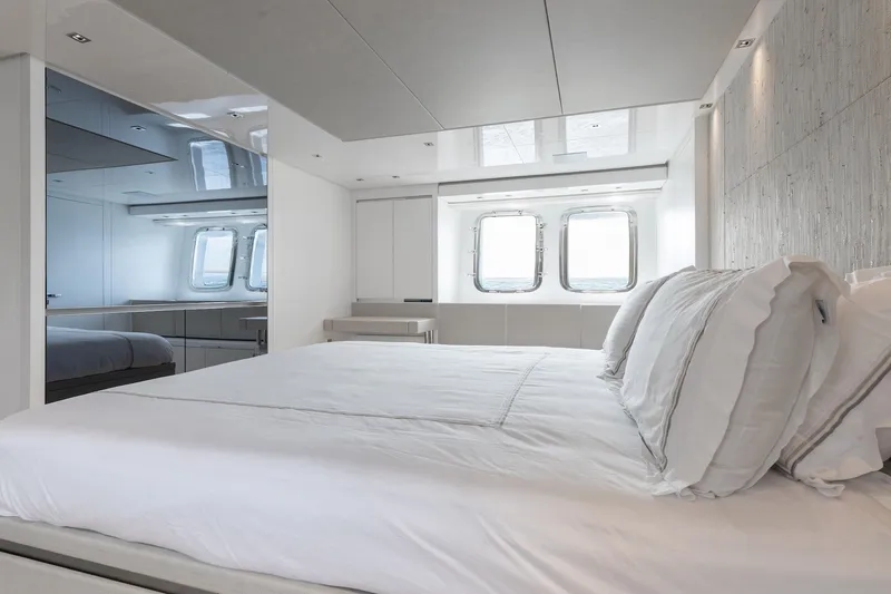 Sasa Yacht Photos Pics Luxurious bedroom interior of 2022 Sanlorenzo SL86 yacht with modern design and ocean view.
