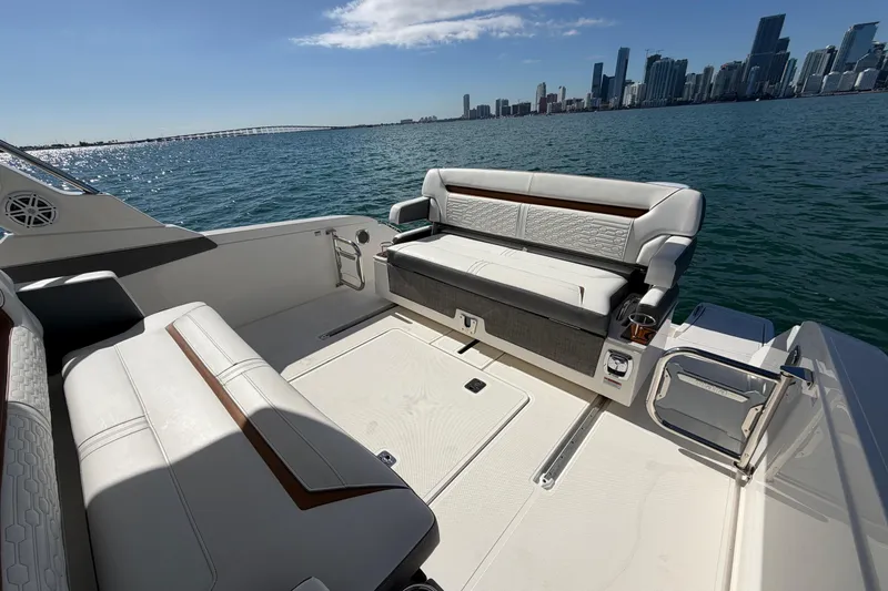 Yacht Photos Pics Luxurious 2022 Tiara Yachts 34 LS interior with city skyline view.