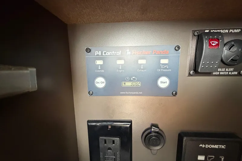  Yacht Photos Pics Control panel of a 2022 Tiara Yachts 34 LS featuring Fischer Panda P4 system.