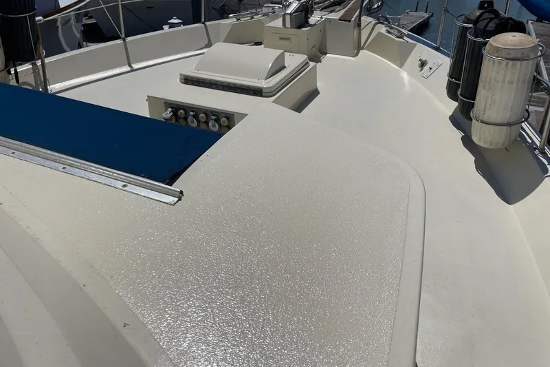 Freedom Yacht Photos Pics 1976 Hatteras 48 Long Range Cruiser deck with equipment and railing.