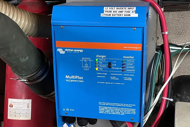 Freedom Yacht Photos Pics Victron Energy MultiPlus inverter in 1976 Hatteras 48 Long Range Cruiser engine room.