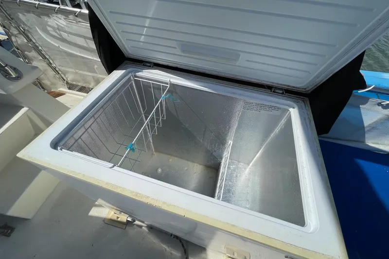 Freedom Yacht Photos Pics Open freezer on 1976 Hatteras 48 Long Range Cruiser boat deck.