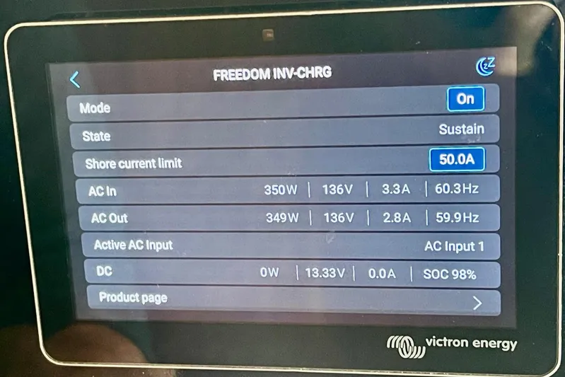 Freedom Yacht Photos Pics Display screen showing Victron Energy system settings on a 1976 Hatteras 48 Long Range Cruiser.