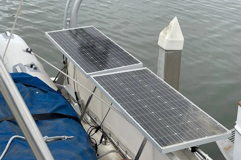 Freedom Yacht Photos Pics Solar panels on a 1976 Hatteras 48 Long Range Cruiser by the dock.