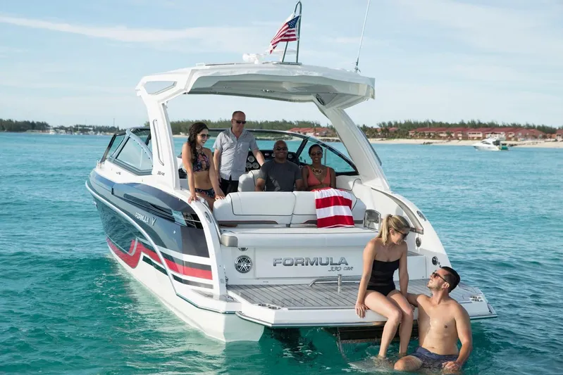  Yacht Photos Pics 2020 Formula 330 Crossover Bowrider with people enjoying the water.